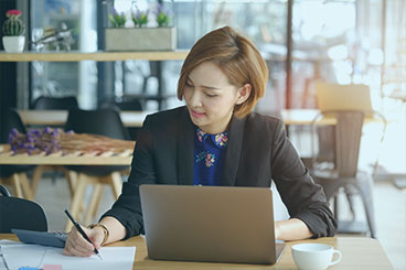 Lady working at home from laptop