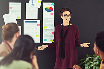 Lady presenting to class