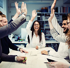 Team leaders high fiving each other