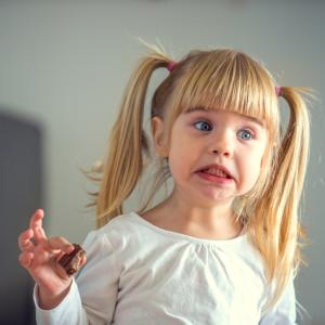 Young girl with a cheeky smile