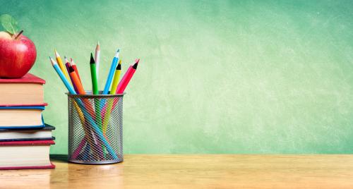 Books and pens on desk