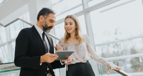 Man and woman discussing a new idea together