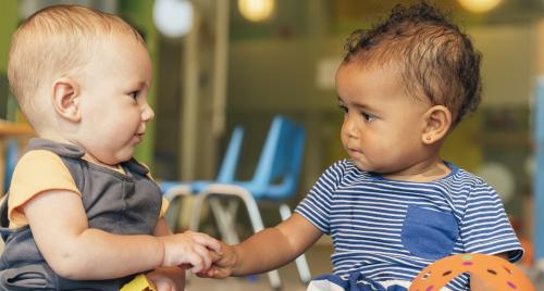 Babies playing together