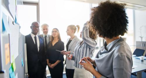 Workers brainstorming in office