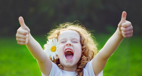 Little girl giving thumbs up