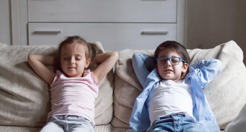 Kids chilling out on couch