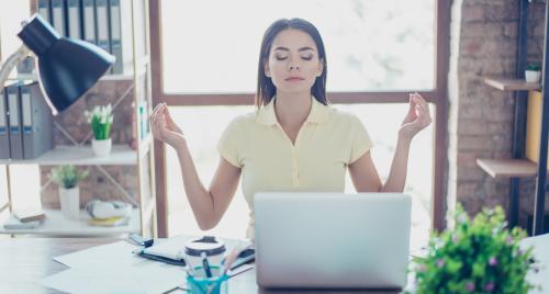 Overwhelmed lady at desk