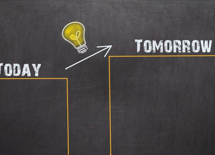 Blackboard with words today and tomorrow