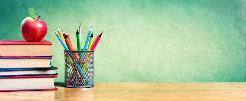 Books and pens on desk