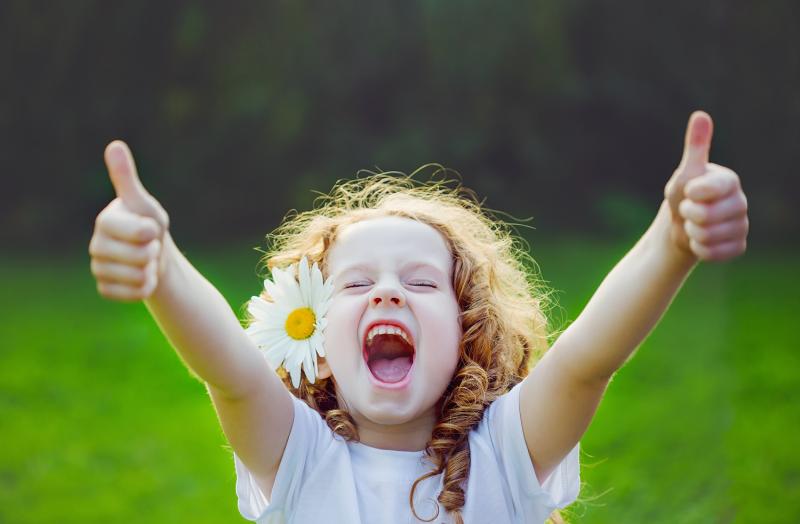 Little girl giving thumbs up