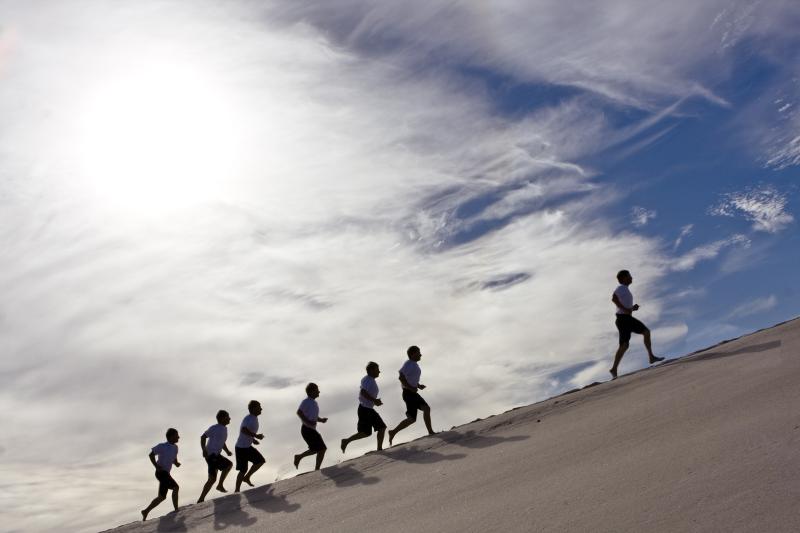 People walking up hill