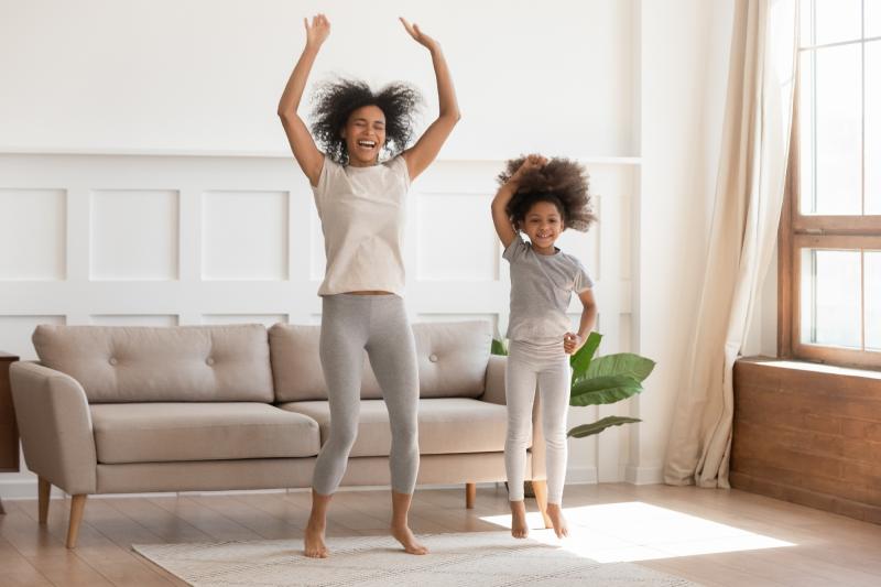 Kids jumping in living room