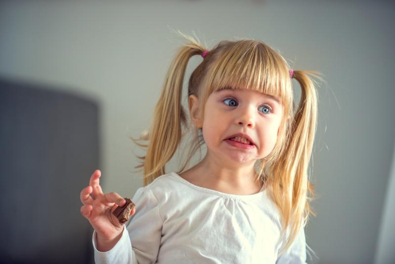 Young girl with a cheeky smile