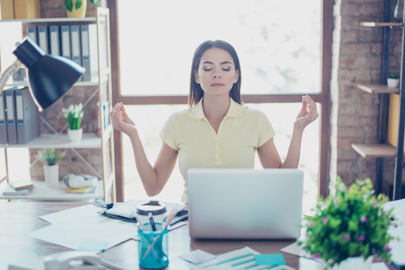 Overwhelmed lady at desk